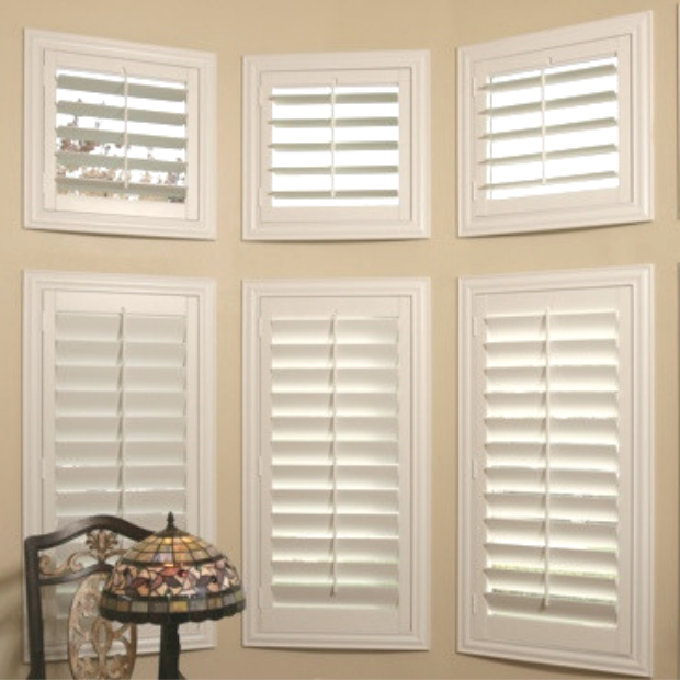 Sunburst shutters on a Houston bay window