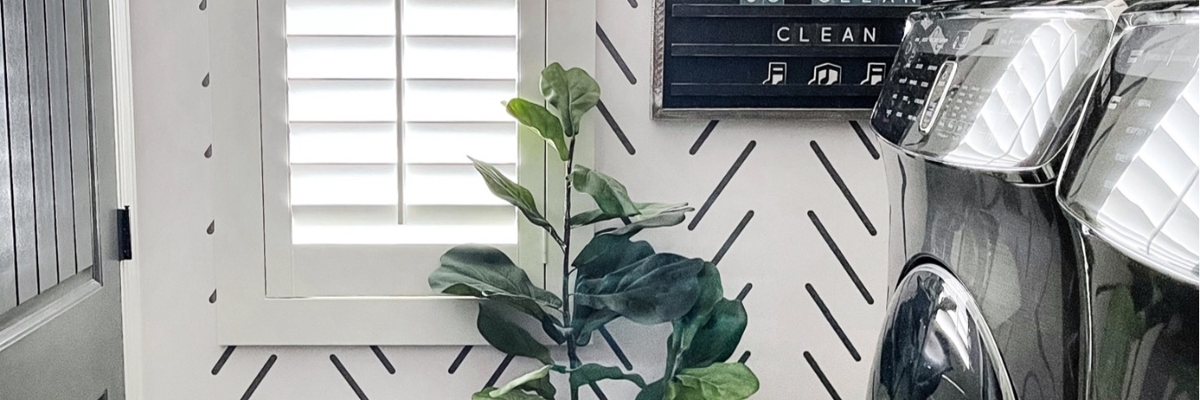 Plantation shutters in a laundry room