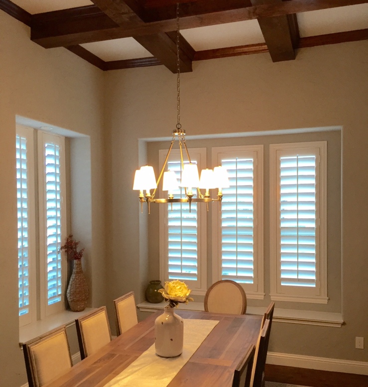 Dining room with shutters in Houston