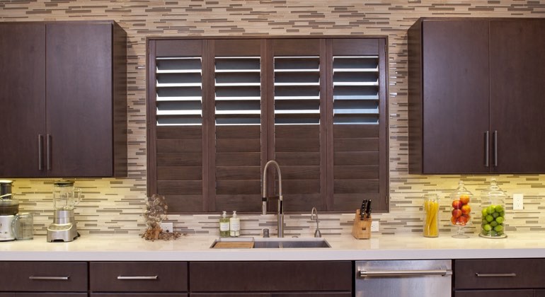 Divider rail shutters in a Houston kitchen. Houston cafe kitchen shutters