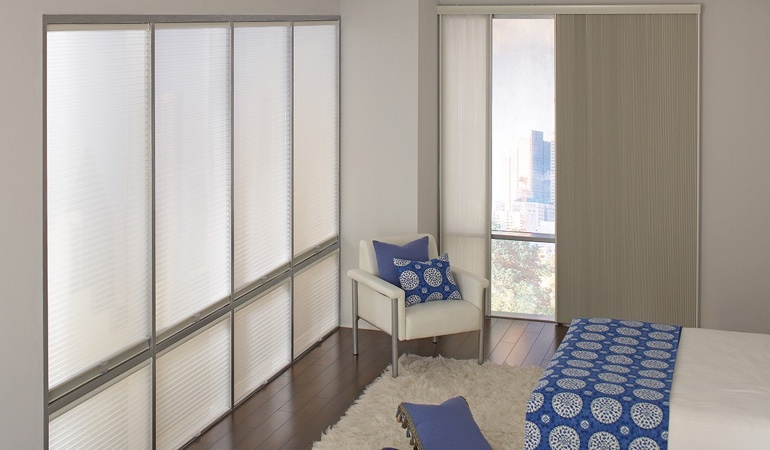 Cell shades are another option to achieve your minimalist design. Cellular shades in a minimalistic apartment.