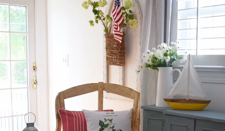Bright sitting corner with faux wood plantation shutters in Houston. Faux wood plantation shutters in Houston