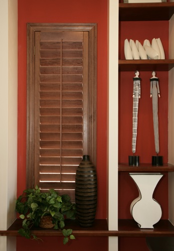 You can even coordinate your wood shutters with shelving. Houston wood shutter shelving