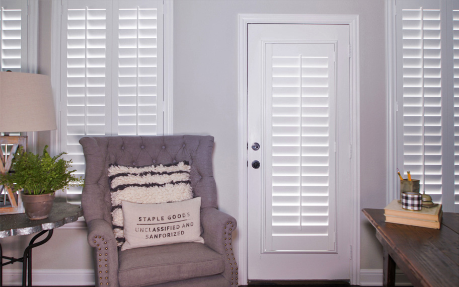 Interior shutters are beautiful and durable window treatments for glass doors in Houston. Polywood shutters on a door
